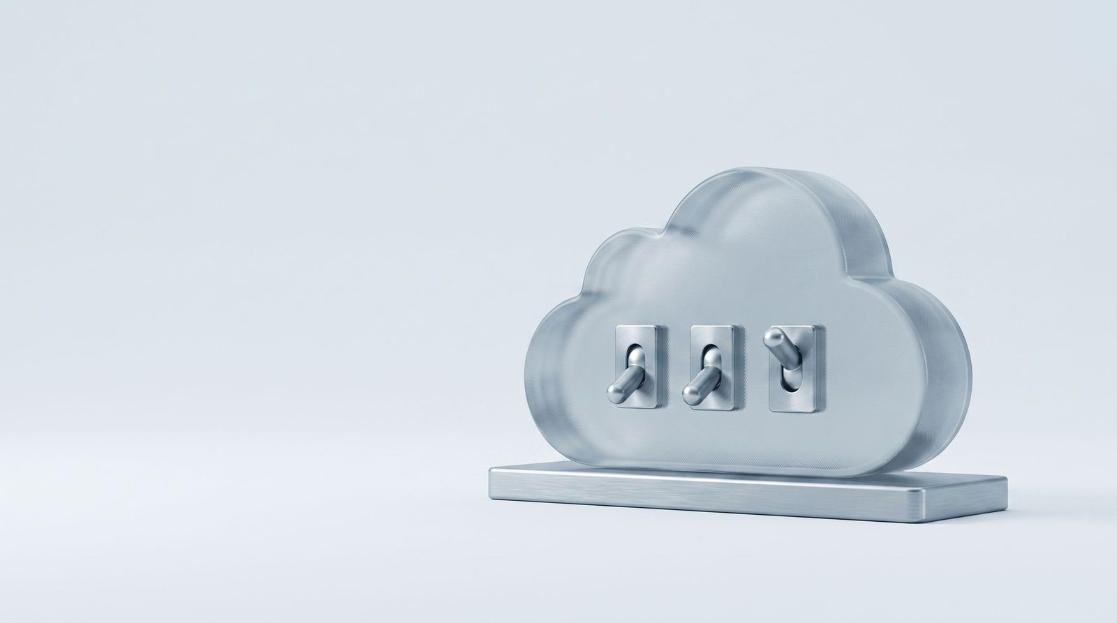 A frosted glass cloud on a steel base with three toggle switches set into it